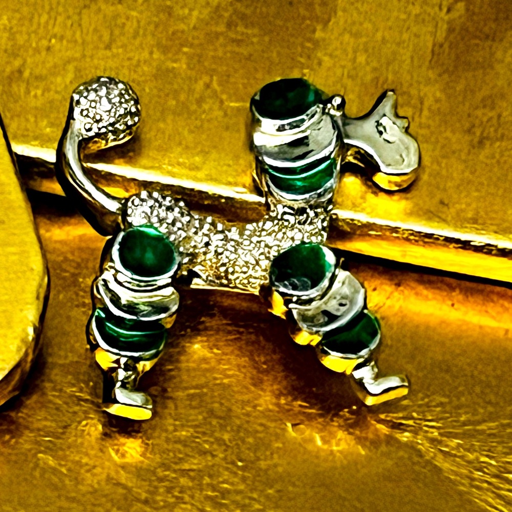 Clear green tiny pin measures 1 inch tall by 1 3/16 inches wide.